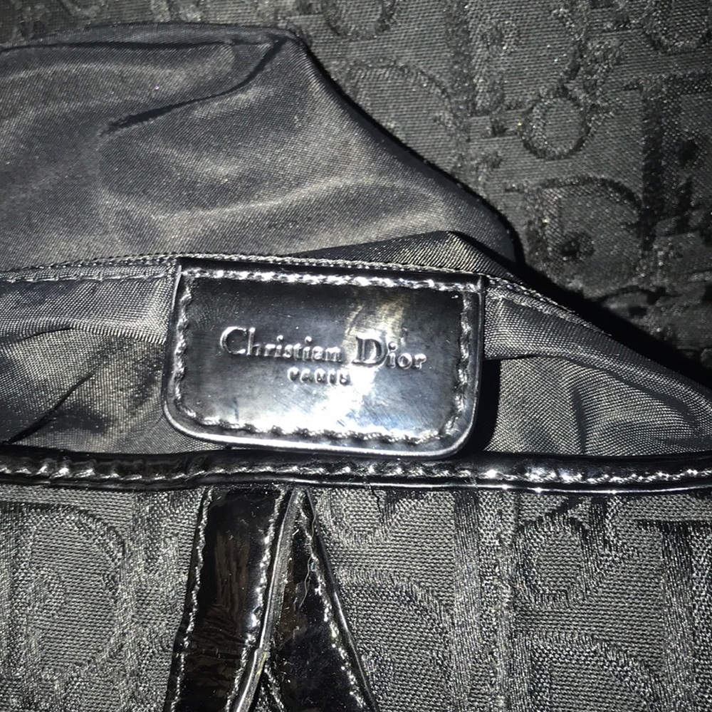 Purse.   one side of the purse is missing the C.